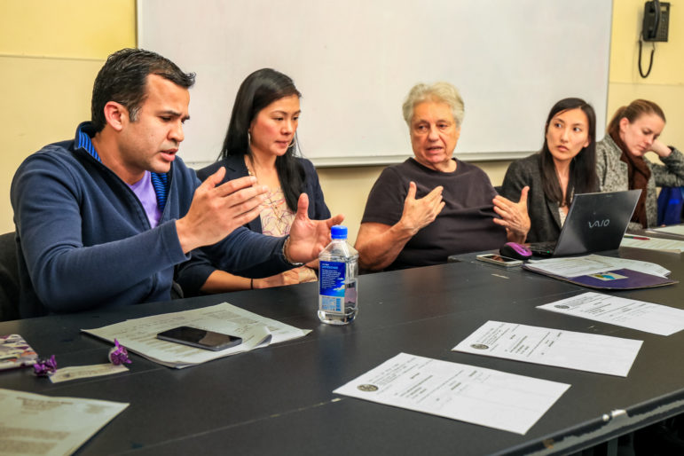 Members of the Community Board 3 Land Use Committee discuss the Chinatown rezoning.