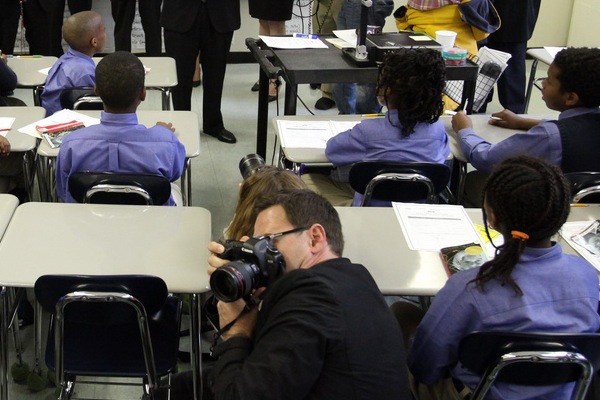 Photographers embed among schoolkids at a visit by then-Mayor Bloomberg and U.S. Education Secretary Arne Duncan to the Kings Collegiate Charter School in 2010. While NYC charter schools are often funded--and lobbied for--with corporate support, direct for-profit ownership is not permitted.