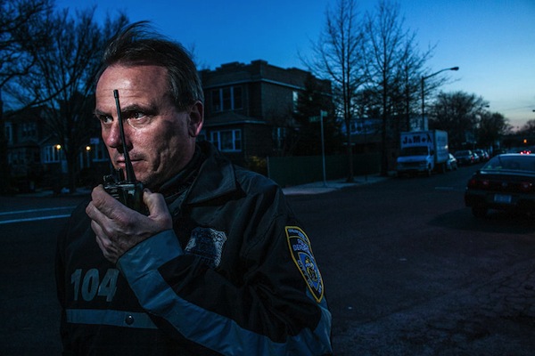 Frank A. Kotnick, Jr. president of the Glendale Civilian Patrol, gets a radio call while making his rounds one night in April. The Glendale group is one of several citizen anti-crime efforts that remain active.