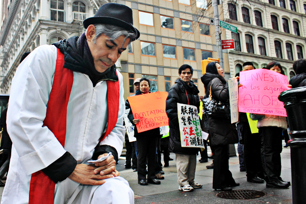 Protesters outside 26 Federal Plaza, where religious activists stage a weekly prayer demonstration against immigration policies.