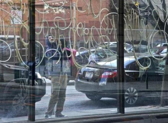 A view through the window of an empty storefront on Willoughby between Duffield and Bridge. The major rezoning of Brooklyn in 2004.