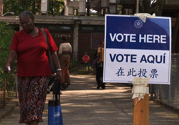 Voters heading to and fro the polling place at the Van Dyke Senior Center on Dumont Street in Brooklyn.