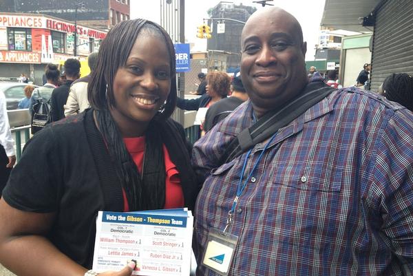 77th district Assemblywoman and 16th council district candidate Vanessa L. Gibbons greets campaign supporter Danny Ford on his way to work at Third Venue and East 149th Street. Gibbons visited his church, The Lord's Church three weeks ago. Campaign manager Benny Catala stands in the background.