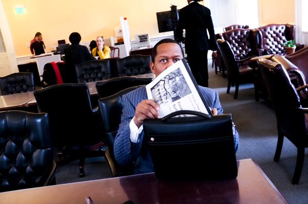 Freshman Councilman Andy King, seen here packing up after a budget briefing, is hoping to hang on to the seat he's held for less than a year.