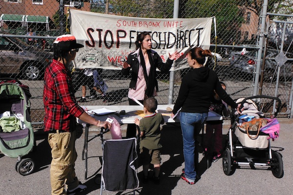 Opponents rally against the FreshDirect proposal.