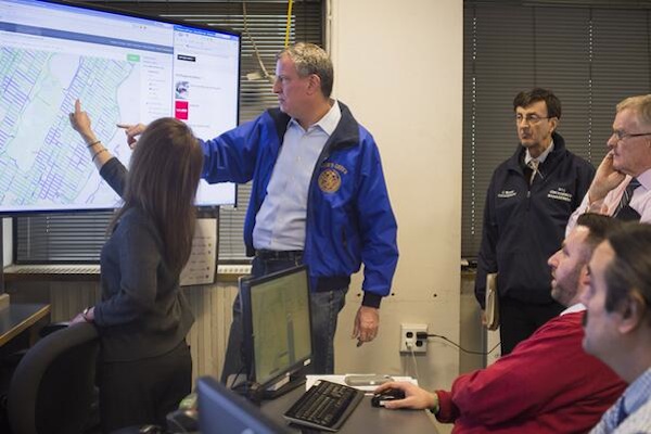 Mayor De Blasio gets briefed on today's snowfall.