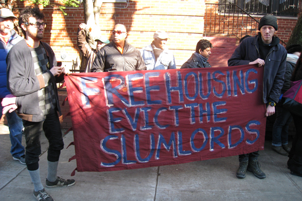 Members of the Bushwick Housing Independence Project rally outside the home of landlord Joel Israel, linked to several Brooklyn buildings with high numbers of housing-code violations.