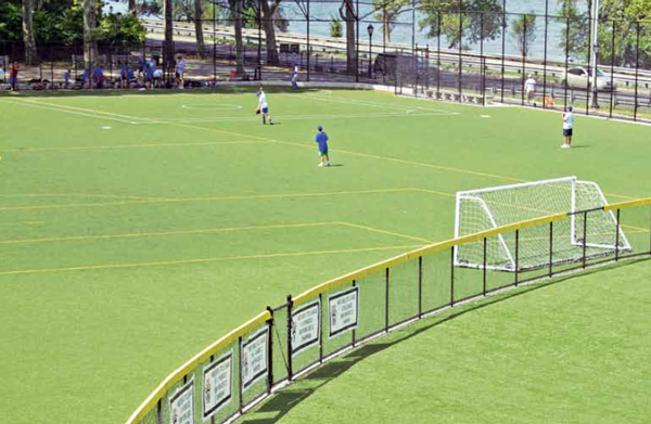 Centerfield runs into the soccer pitch at Riverside Park. Different sports interact differently with their playing surfaces.