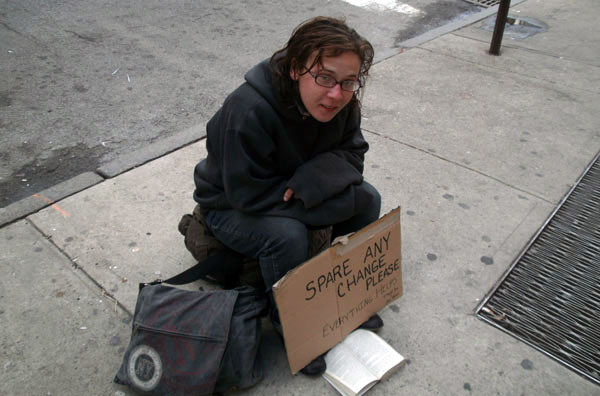 Bug at her sidewalk spot near Lincoln Center. She says passersby are sometimes very rude, and sometimes very generous; one gave her $100.