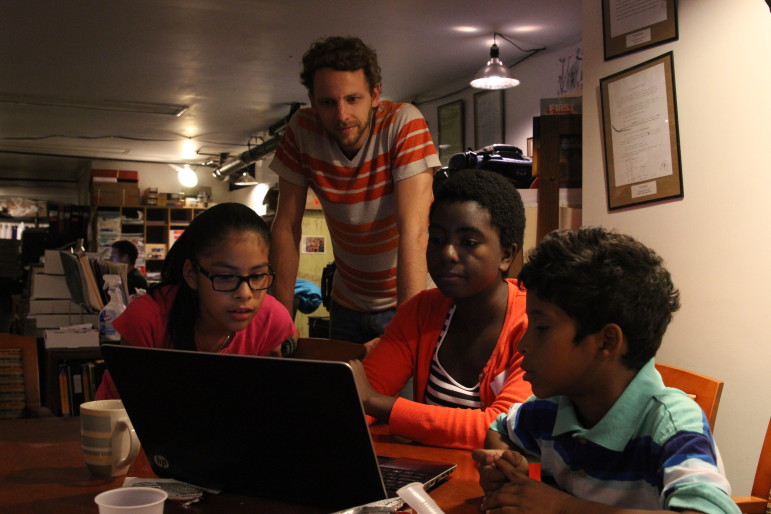 In the basement of 826NYC, Monica, Cutter Wood, Saeeda and Josh read over the dialogue for the concluding scene to their film noir.