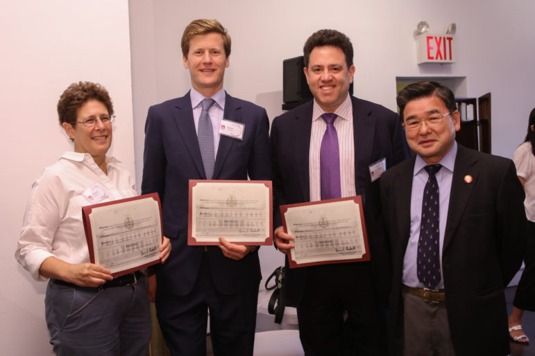 New FCCA board members Barbara Garii, Ph.D., Simon Gerson, Raymond Jasen, and New York City Council Member Peter Koo.