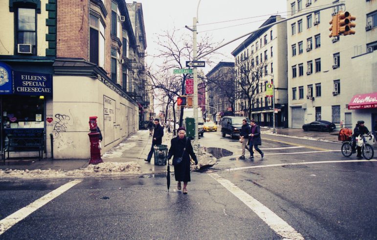 Crossing the street in SOHO.