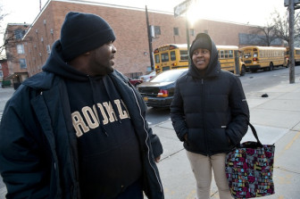 Ronald Johnson and his daughter Felicia in 2012. The two are part of a pilot program to provide supportive housing to families involved in the child welfare system.