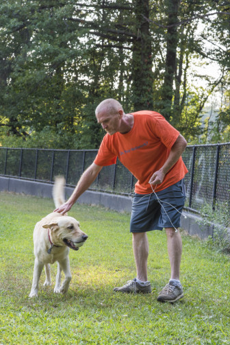 Walking the dog in Van Cortland Park. 