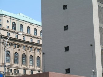 Brooklyn's courthouse, in the background, and the House of Detention there. A Bloomberg administration push to move large numbers of inmates off Rikers to the Brooklyn House and to a new jail in the Bronx ran into fierce opposition.