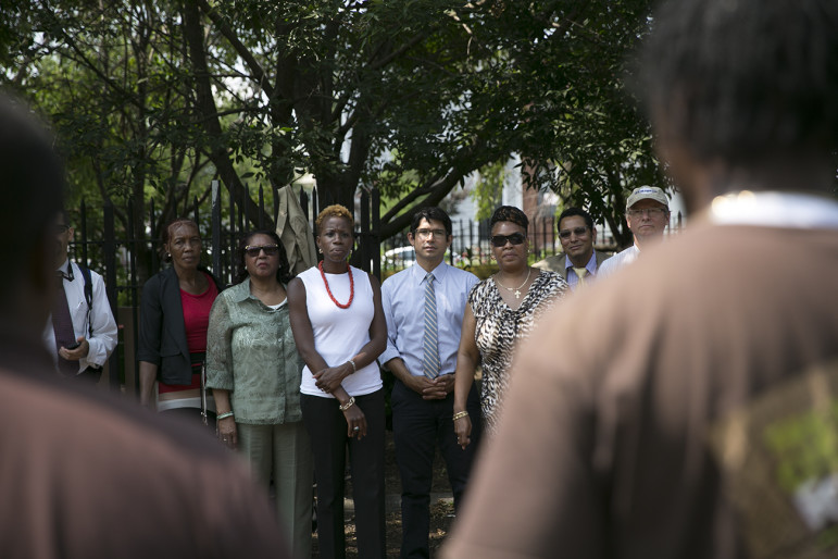 NYCHA chairwoman Shola Olatoye, in white shirt, at a 2014 outreach event in Brooklyn. Her fans credit her with being more accessible, but there have been limits on public engagement's impact on NYCHA policy.