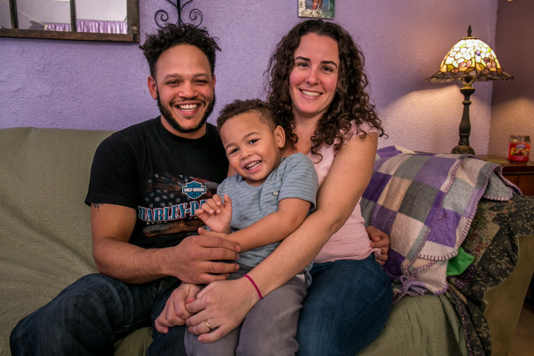 Alex Lora with son Alex III and wife Gabrielle. He says of his time in immigration detention: 'I do not recommend that even to an enemy.'