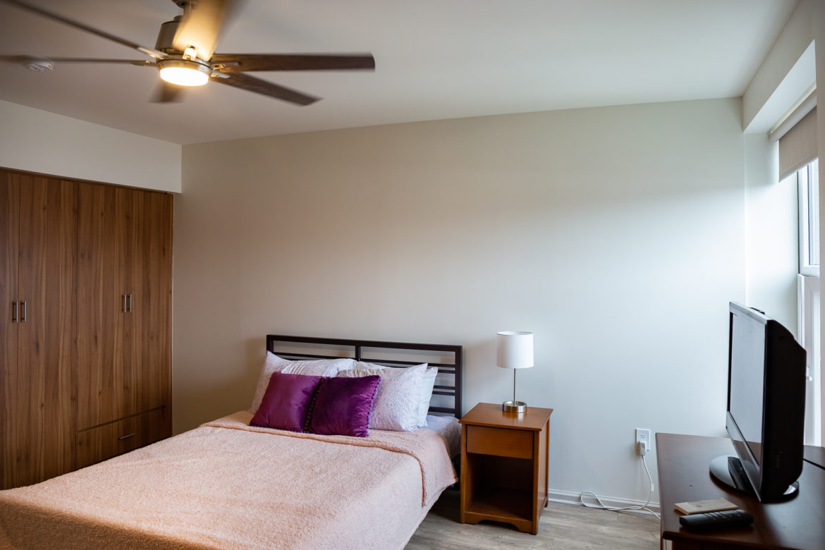 A bedroom in a supportive housing complex in Harlem