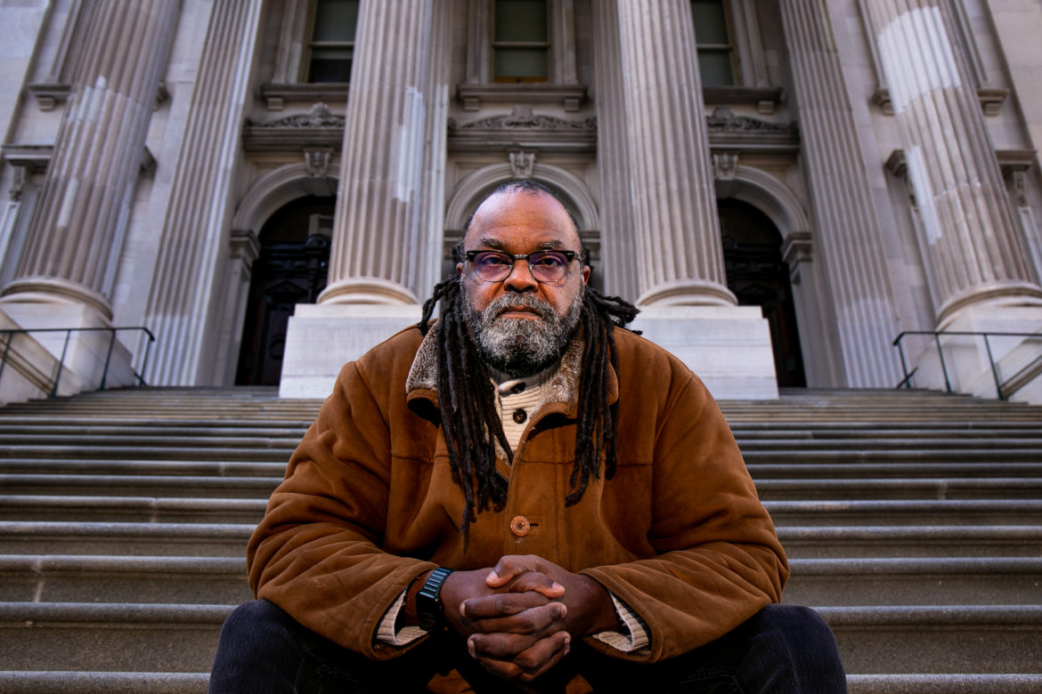 Tom Sheppard, the only elected member of the city's Panel for Educational Policy, at the steps of the Tweed Courthouse building.