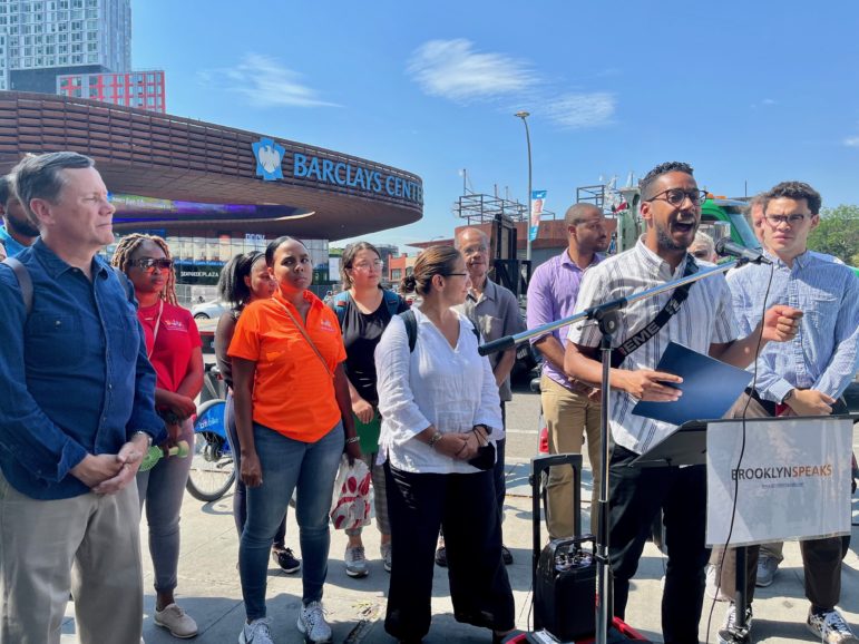 Elected officials and acitvists hold a press conference outside Brooklyn's Barclays Center